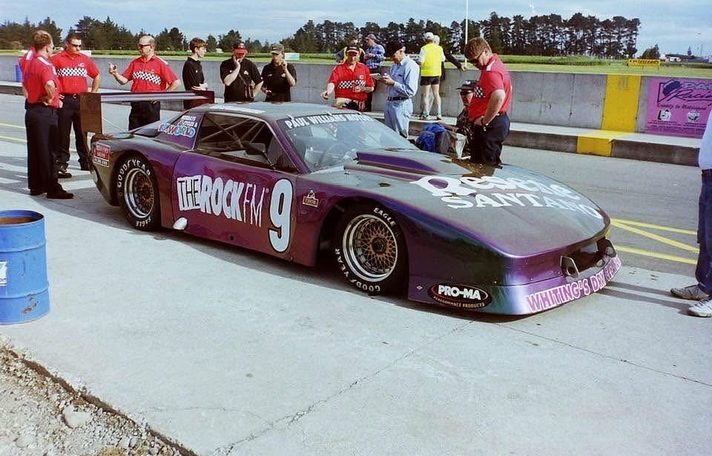 The Camaro in the Ruapuna pits in its colour-shifting livery