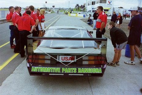 The Camaro from behind: Automotive Parts Rangiora and a USA plate